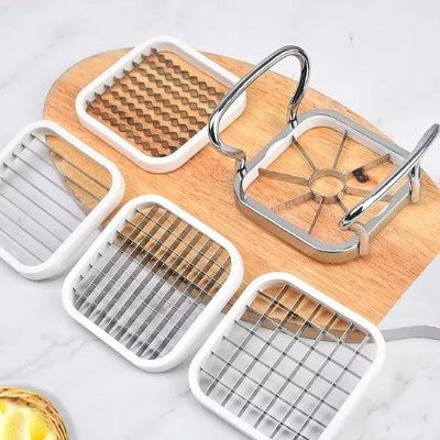 coupe legumes multifonction sur une planche